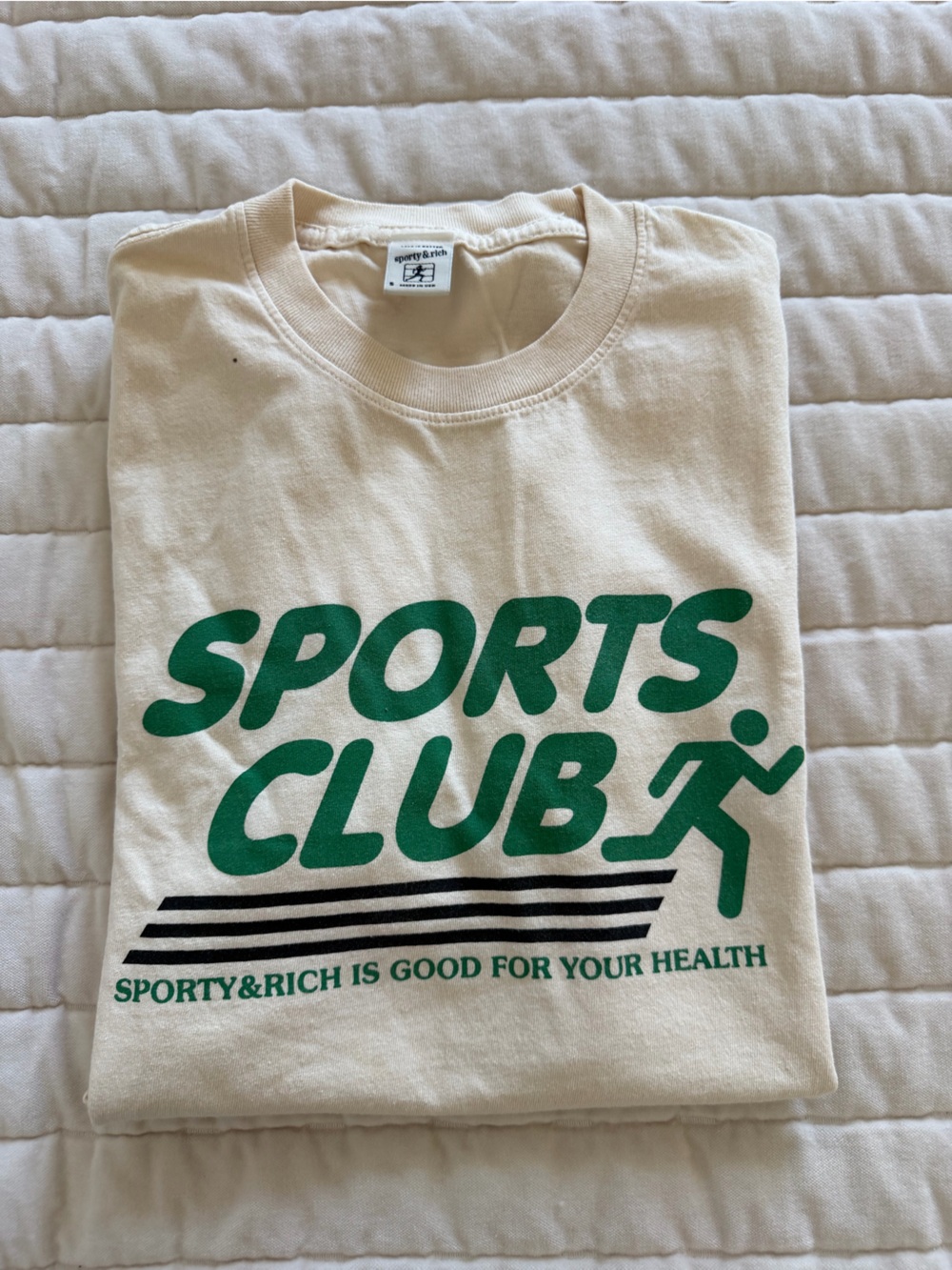 Sporty & Rich Cream Graphic Tee with Green Logo